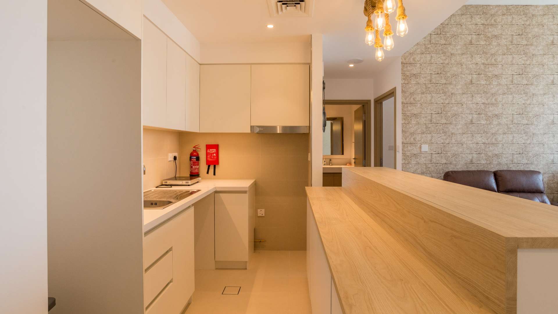 Fully-furnished living room in Creek Horizon apartment, Dubai Creek Harbour, with modern decor