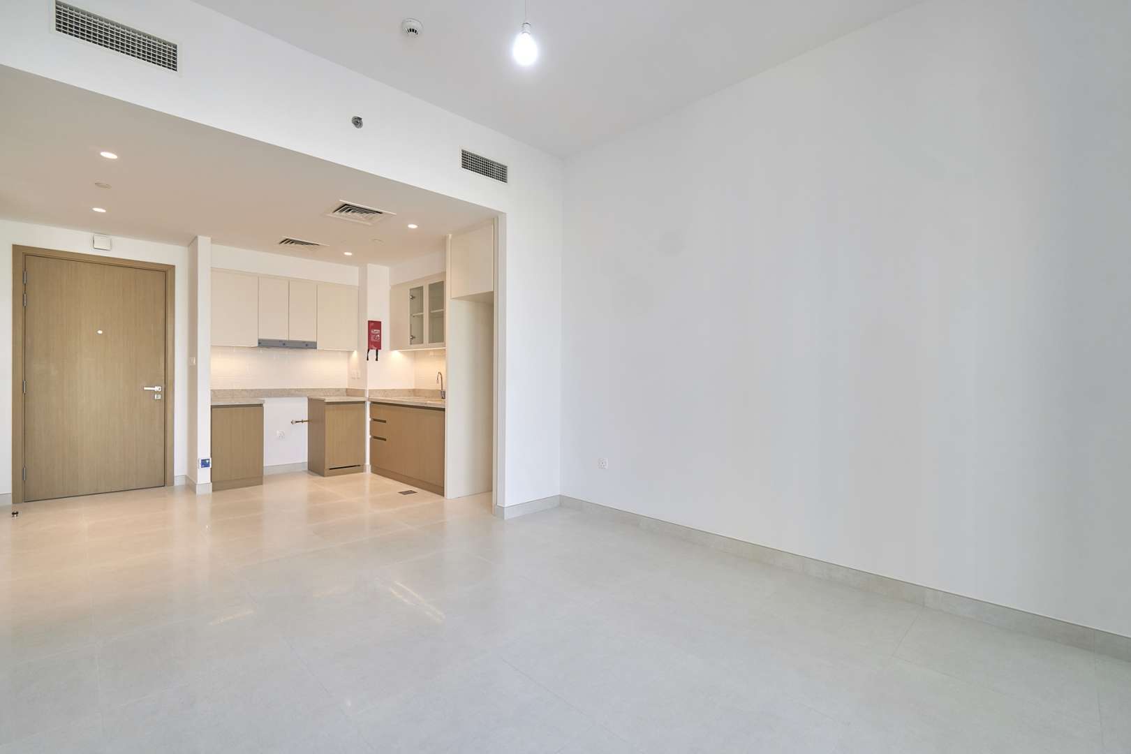 Balcony view from Creekside 18 apartment in Dubai Creek Harbour, showcasing cityscape and skyline