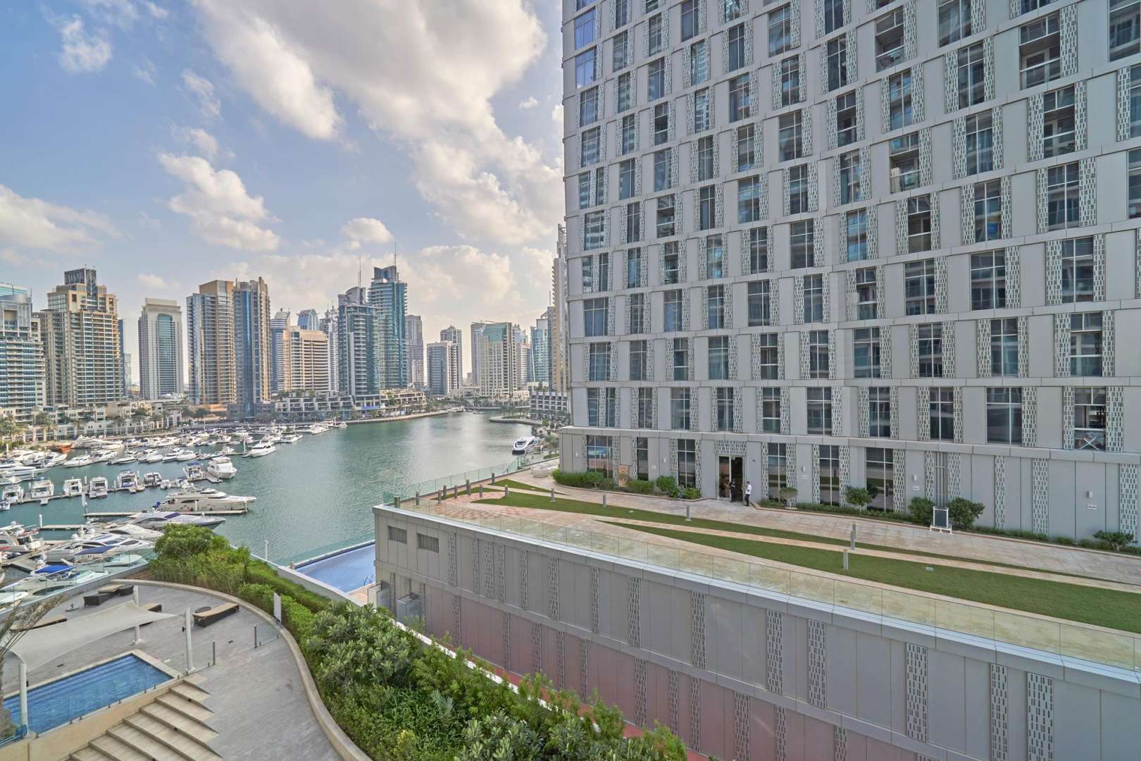 Balcony view from 1-bedroom apartment in DAMAC Residenze, Dubai Marina, showcasing skyline and water