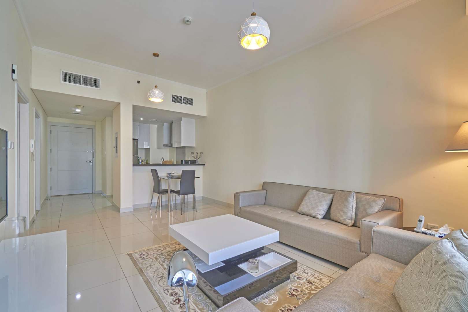 Furnished living area in 1-bed apartment, DAMAC Residenze, Dubai Marina with modern decor