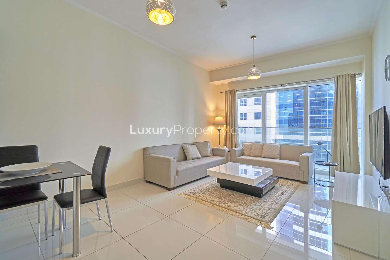 Furnished living room in 1-bed apartment, DAMAC Residenze, Dubai Marina, modern decor, city views