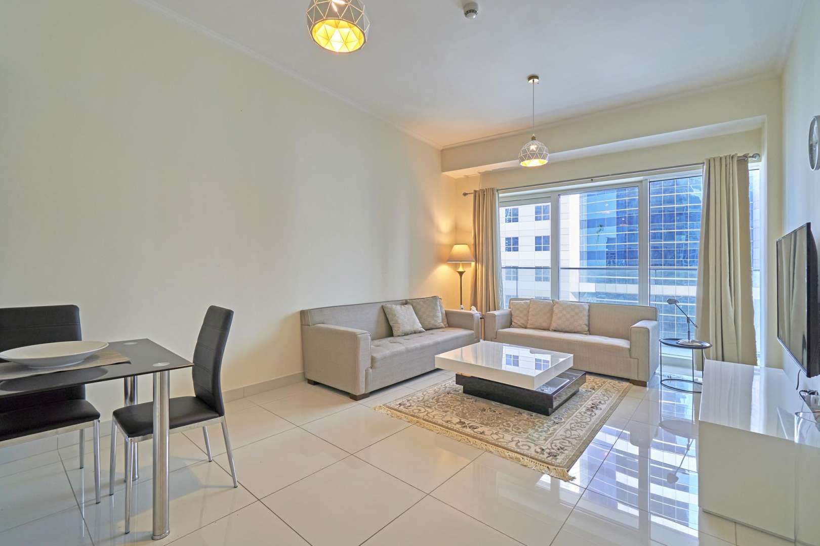 Furnished living room in 1-bed apartment, DAMAC Residenze, Dubai Marina, modern decor, city views
