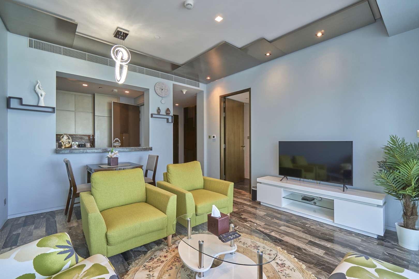 "Spacious balcony view from one-bedroom apartment in Damac Heights, Dubai Marina for rent.",Modern living room in one-bedroom apartment, Damac Heights, Dubai Marina, with stylish decor