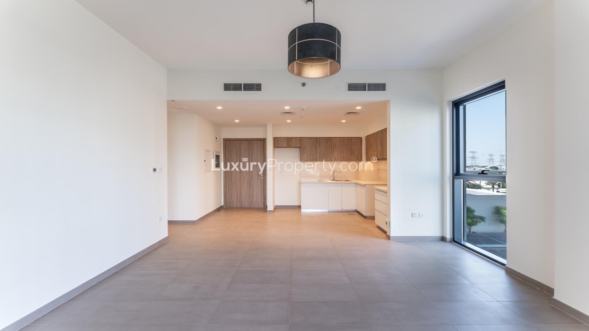 Bright corner kitchen and living area in 1-bedroom apartment, Executive Residences, Dubai Hills Estate