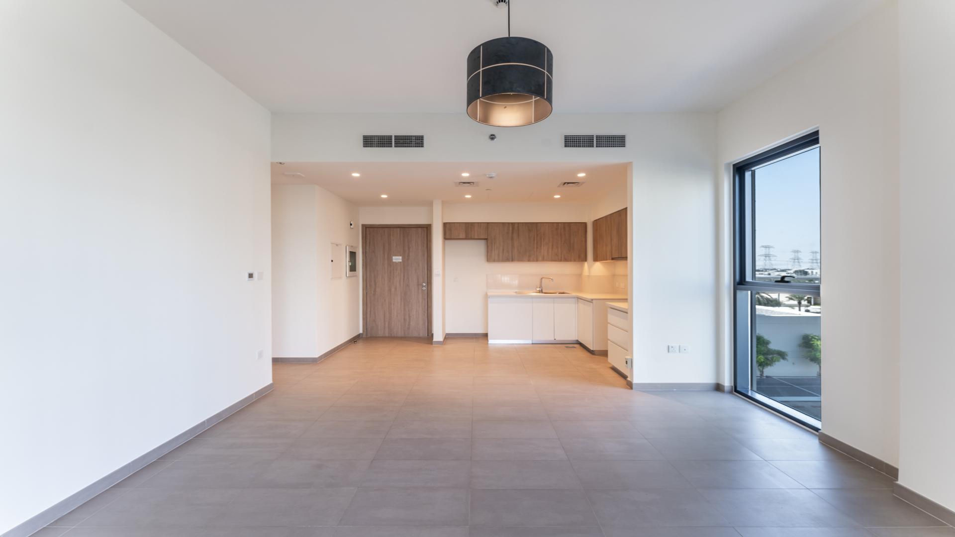 Bright corner kitchen and living area in 1-bedroom apartment, Executive Residences, Dubai Hills Estate