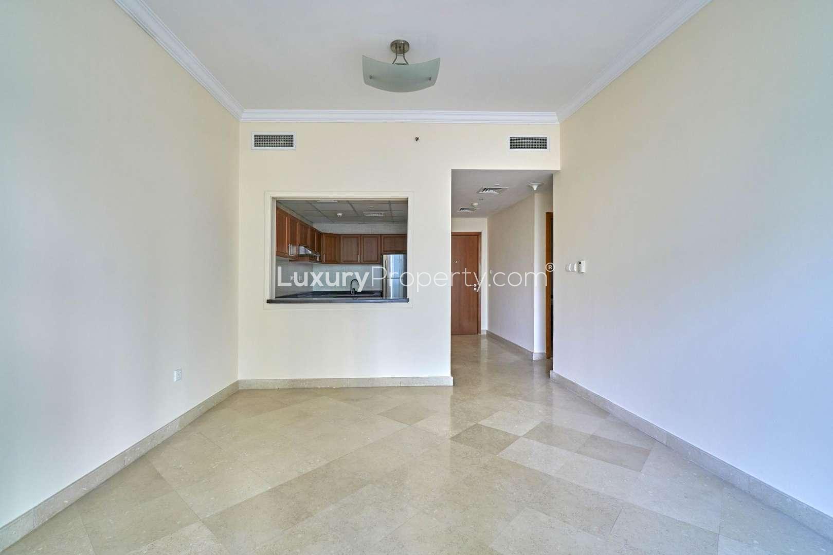 One-bedroom apartment interior with open kitchen in Dorra Bay, Dubai Marina for rent
