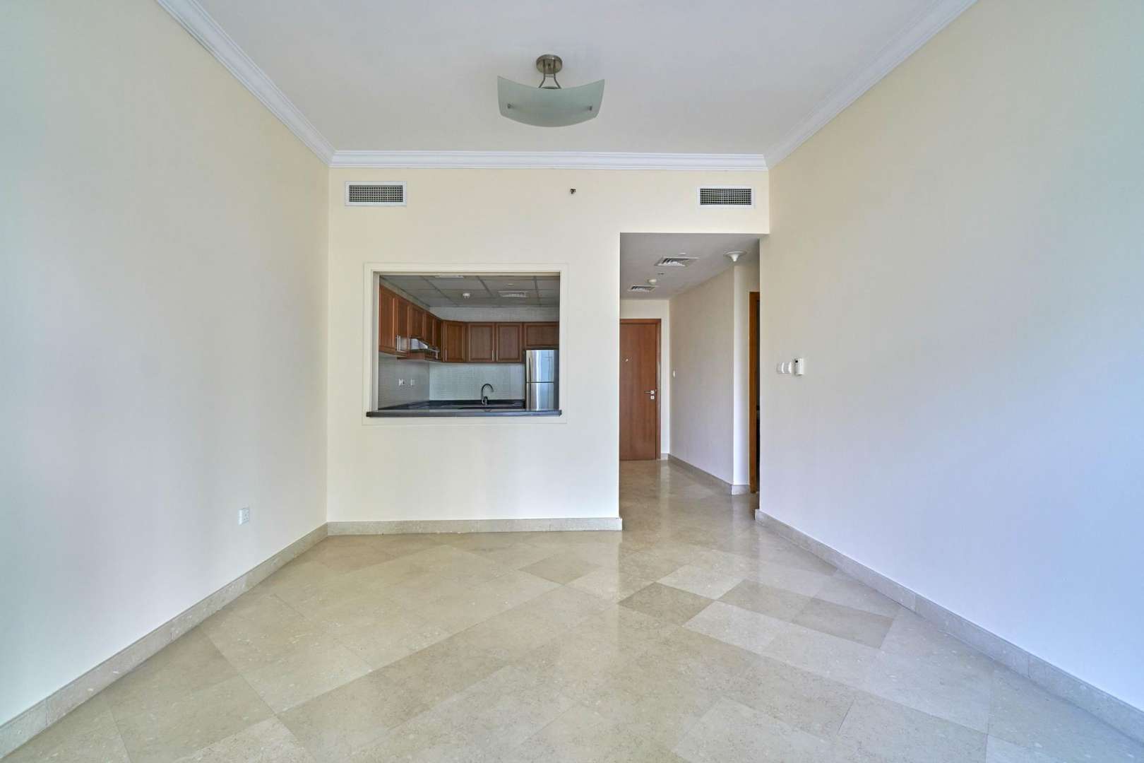 One-bedroom apartment interior with open kitchen in Dorra Bay, Dubai Marina for rent