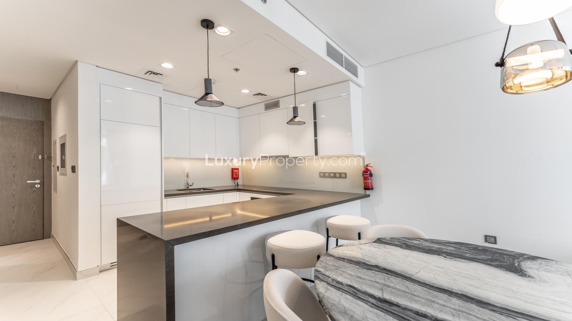 Luxurious kitchen with marble finishes in 1-bedroom apartment, Residences 30, District One