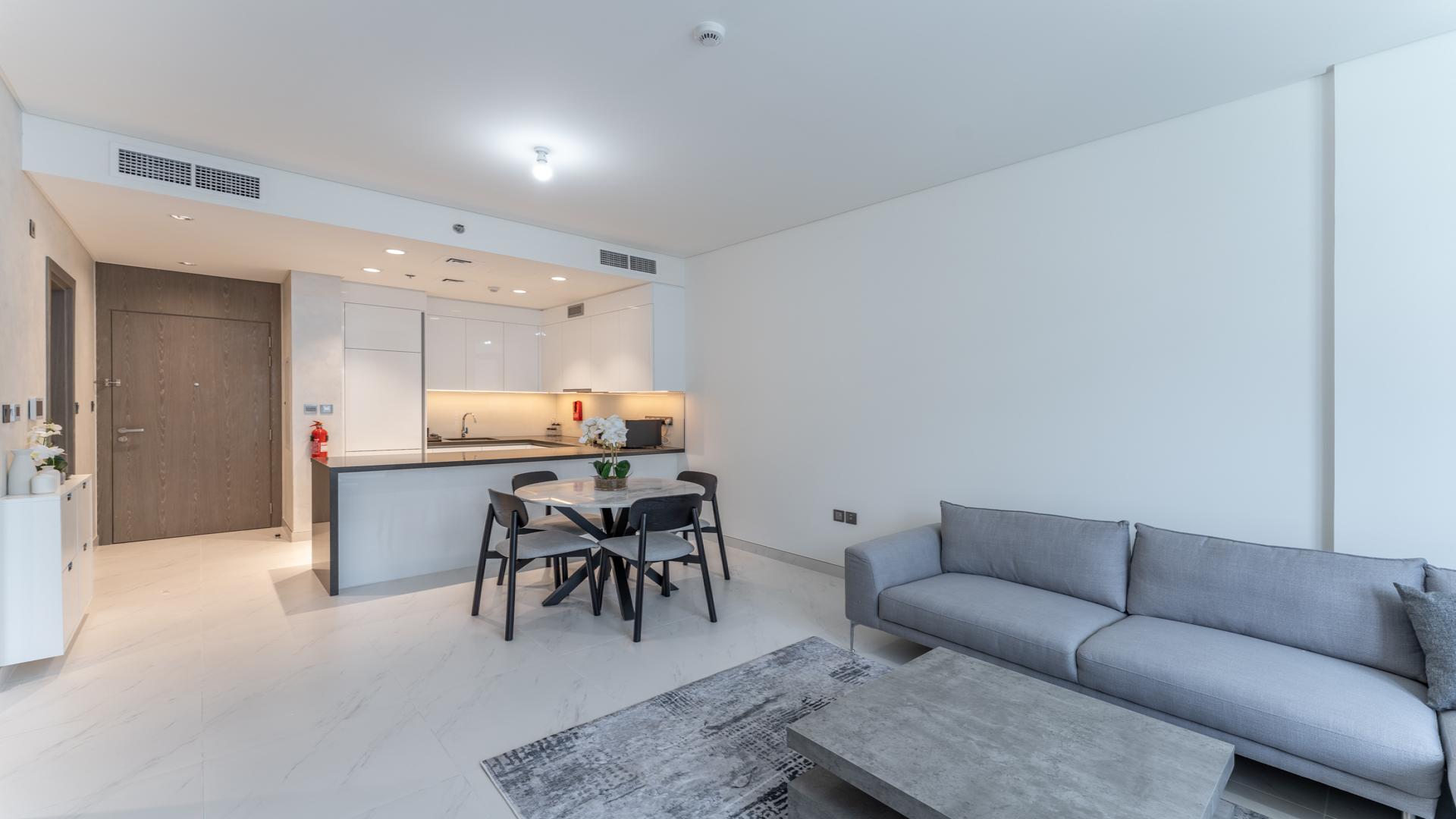 Skyline view from balcony of 1-bedroom apartment in District One, MBR City