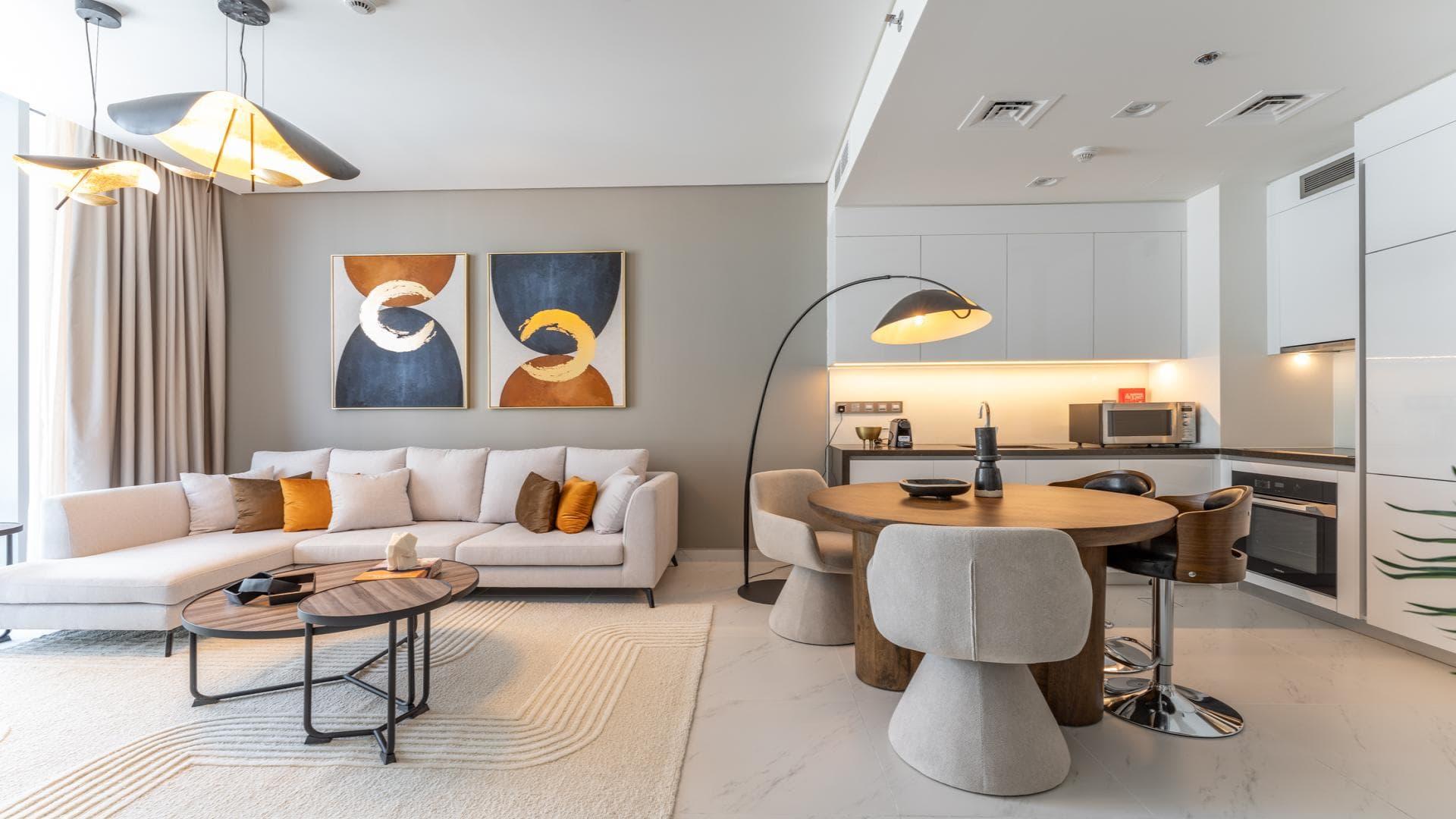 N/A,Modern living room and kitchen in District One apartment, Mohammed Bin Rashid City, for rent