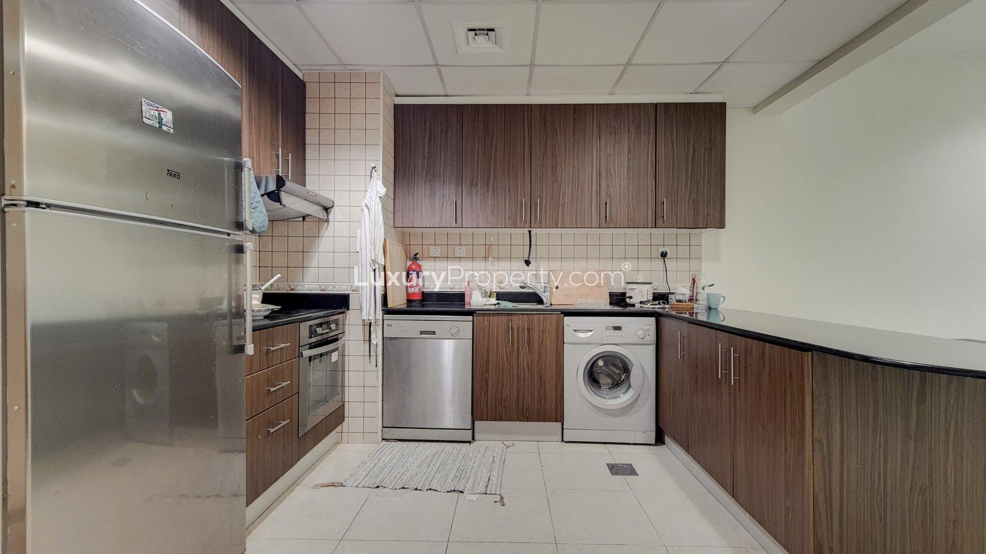 High floor apartment interior with modern kitchen and office space in Dubai Marina