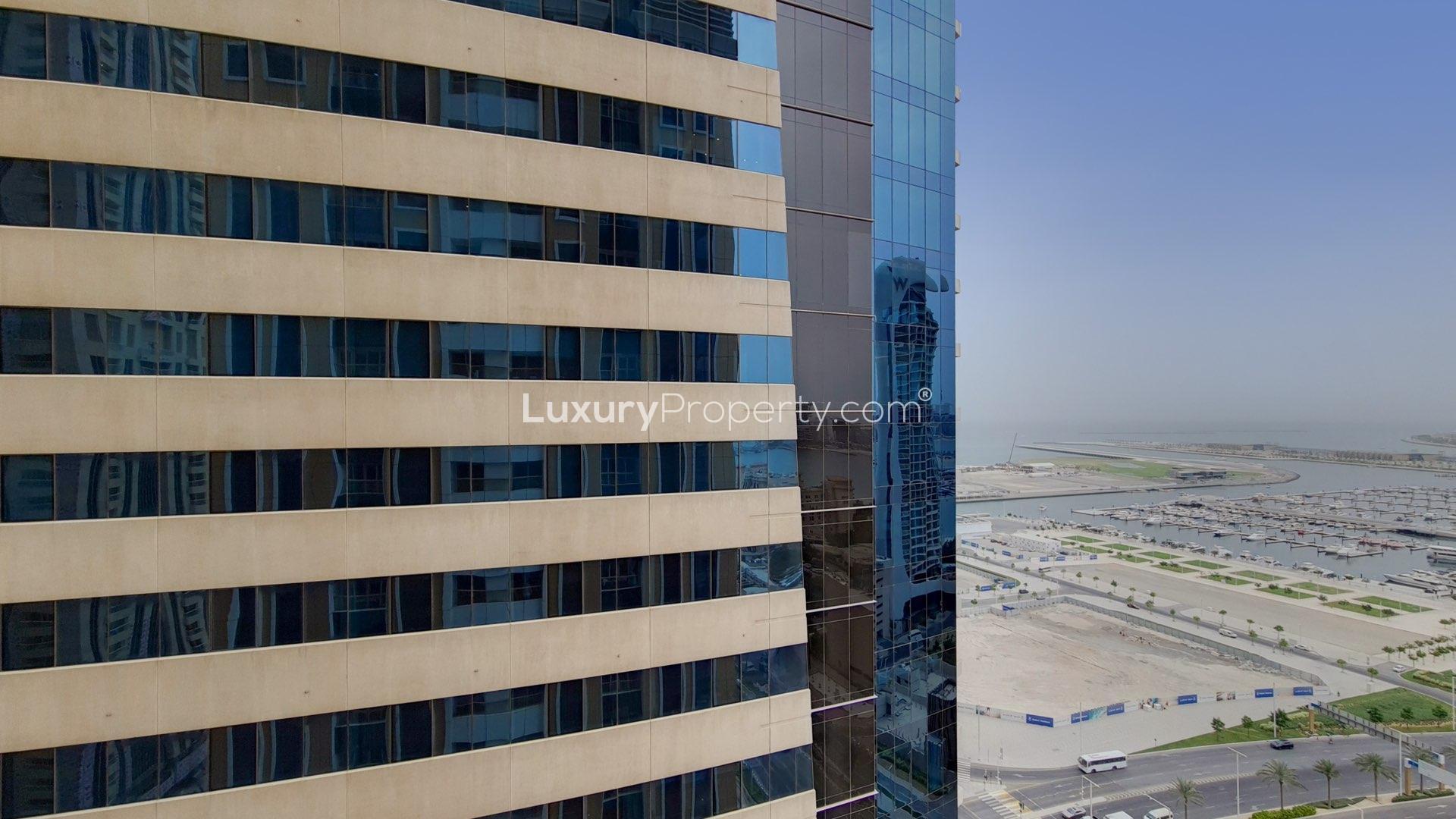 Modern living room in high-floor Dubai Marina apartment, Elite Residence, spacious layout