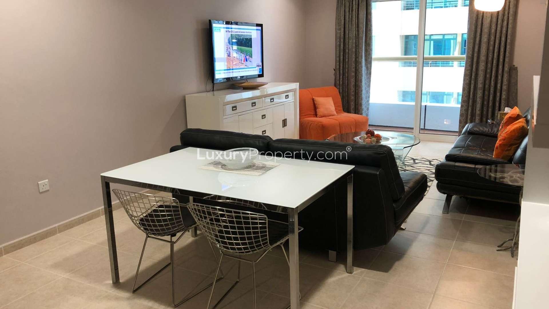 Spacious living area in 1-bedroom apartment, Elite Residence, Dubai Marina, modern furnishings