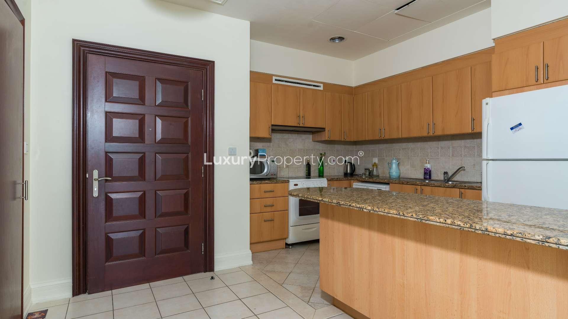 Furnished apartment interior in Emaar 6 Towers, Dubai Marina, featuring dining and study areas