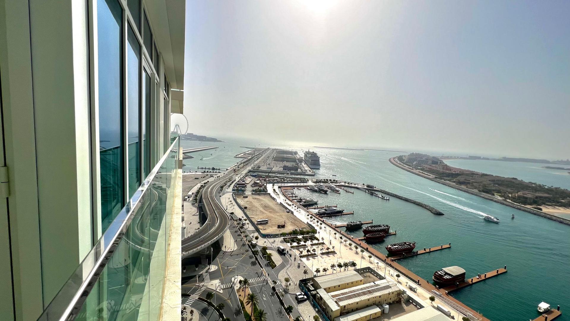 Aerial view of Dubai Marina sea and coastline near Emaar Beachfront, Dubai Harbour