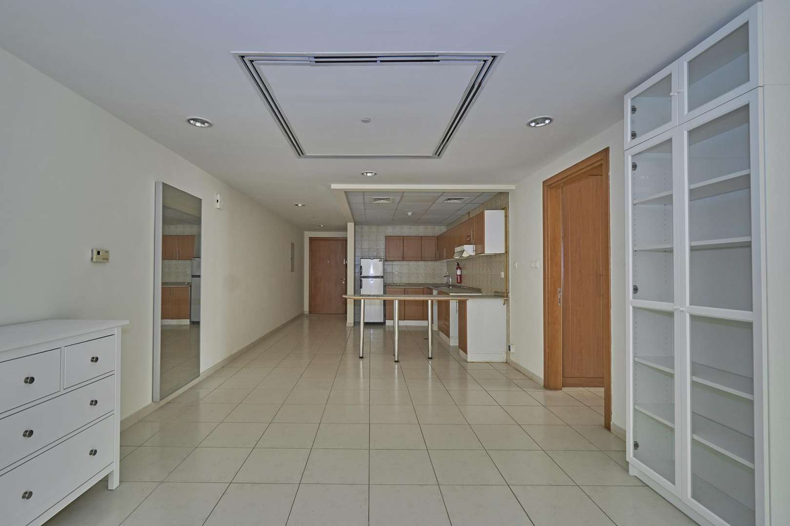 Balcony view from 1-bedroom apartment in Emirates Garden, JVC, showing surrounding buildings and construction