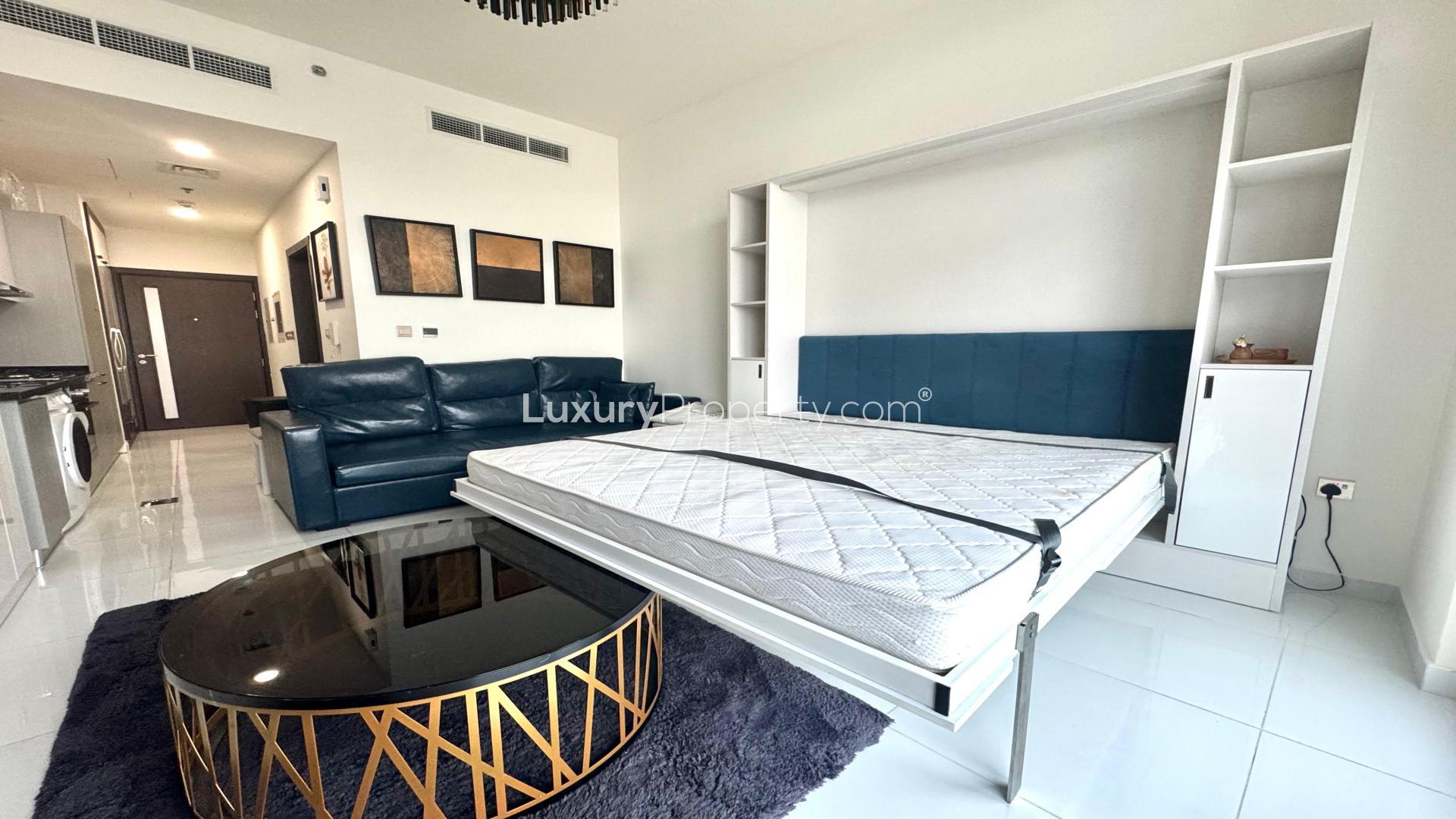 Furnished studio apartment in Miraclz Tower, Arjan, featuring modern decor and cozy living space