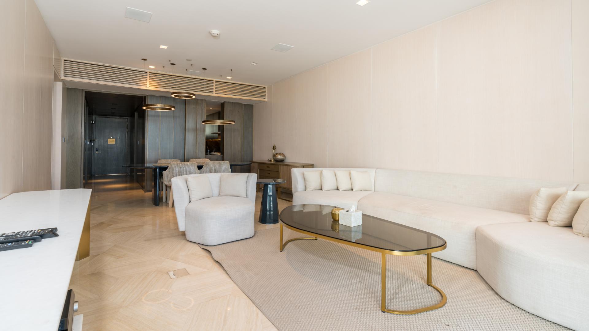 "Modern dining area in Palm Jumeirah apartment, featuring stylish table and chairs, elegant decor.",N/A,Modern kitchen with sleek cabinetry in Palm Jumeirah apartment, available for rent