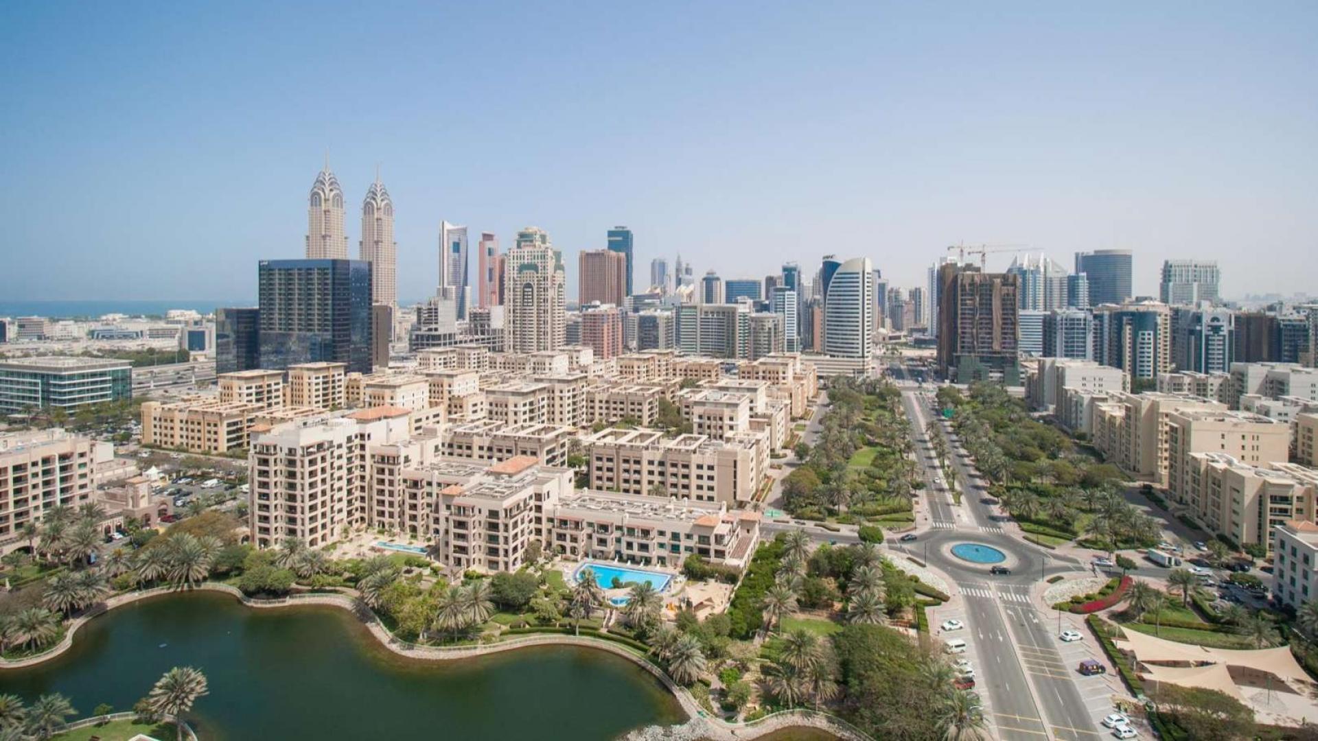 Aerial view of Golf Towers community in The Views, showcasing greenery and skyline