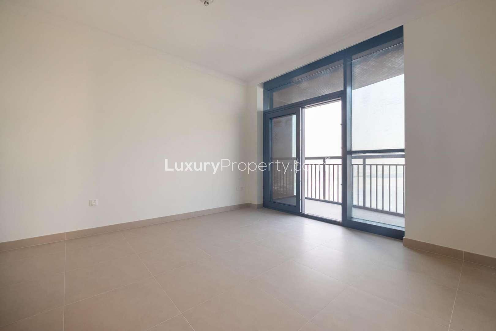 Modern one-bedroom apartment interior with large windows in Dubai Creek Harbour