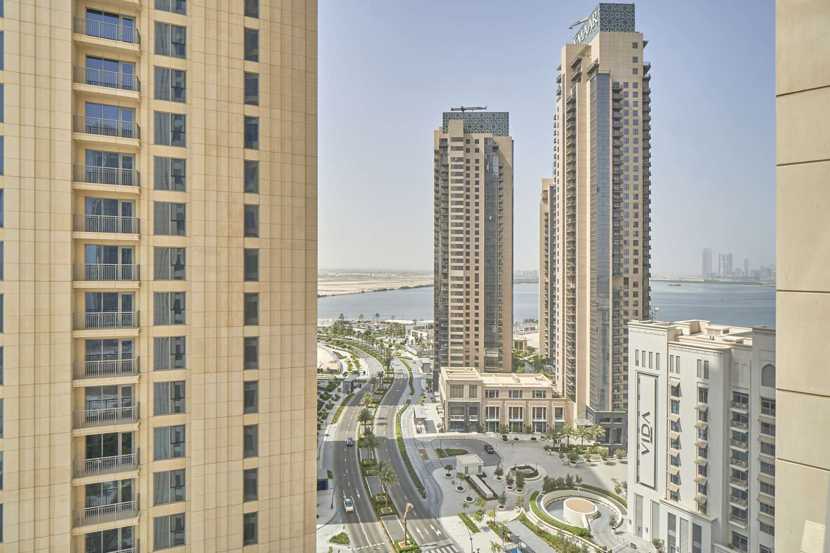 Stunning furnished bedroom in Dubai Creek Harbour apartment with modern decor and large window