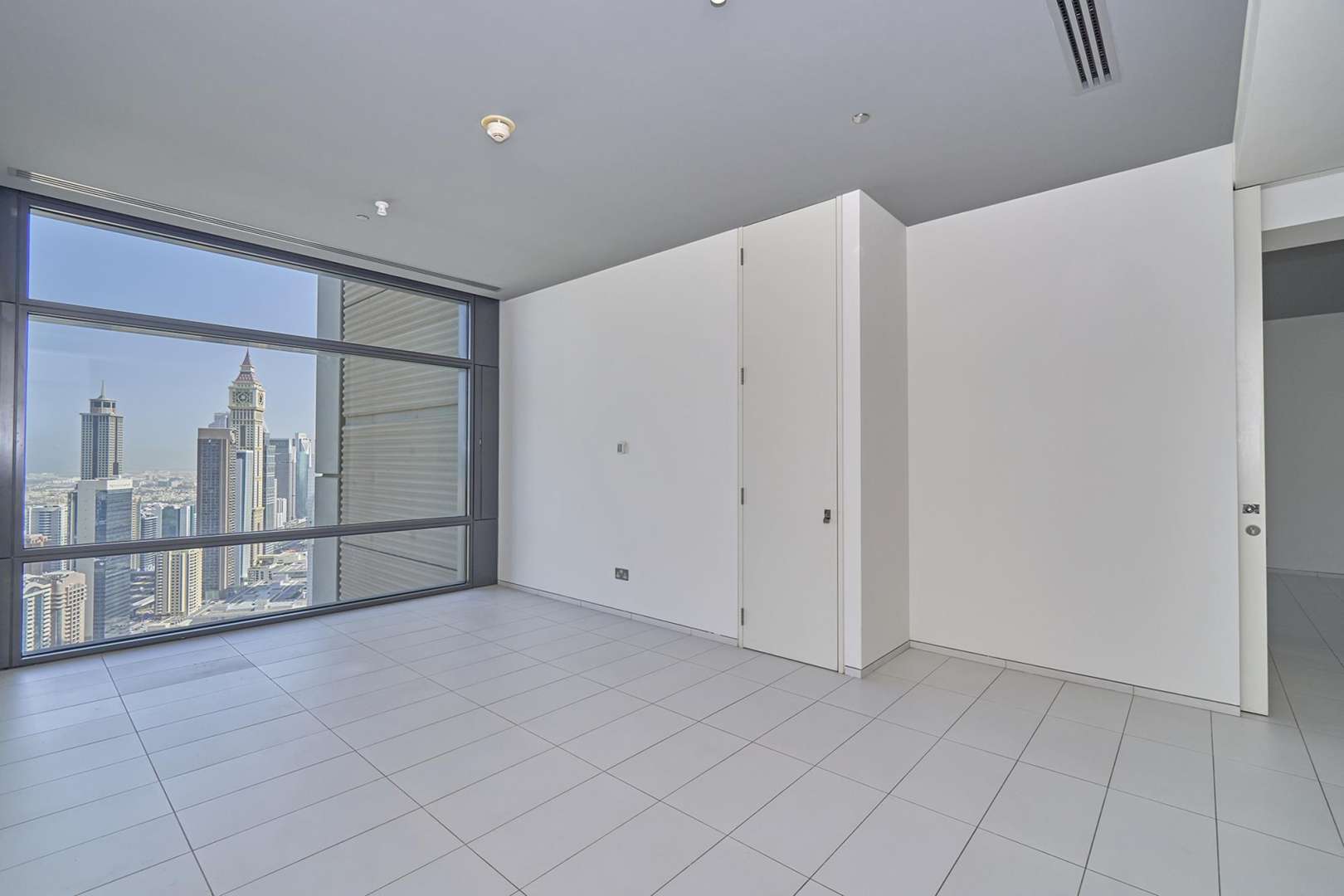 Modern kitchen and living area in spacious DIFC apartment for rent, Index Tower