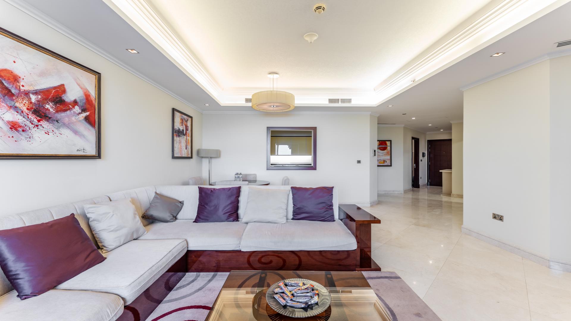 Balcony view from upgraded apartment in Grandeur Residences, Palm Jumeirah with lush surroundings