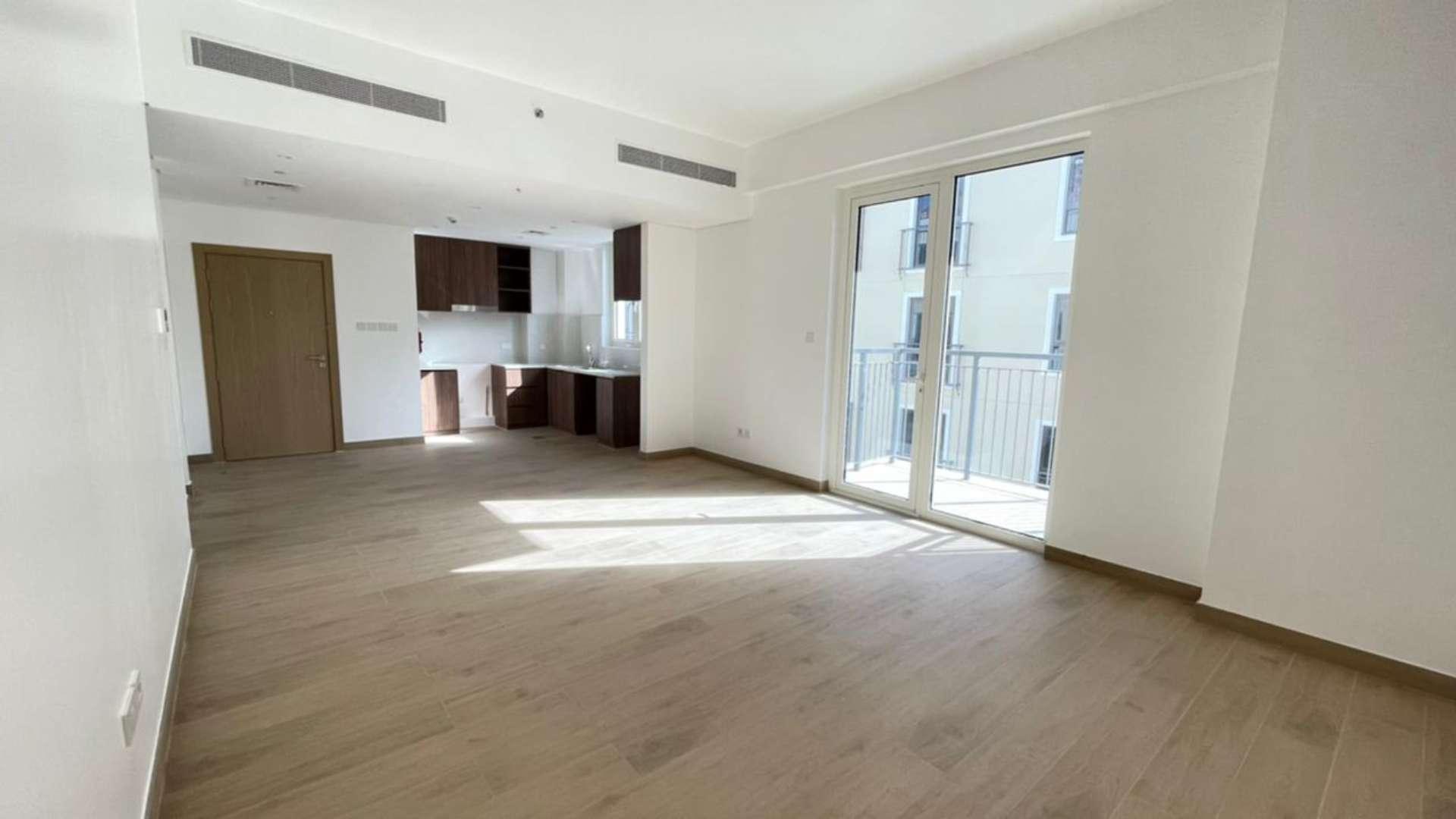 Outdoor pool view at La Mer apartment in Jumeirah, available for rent