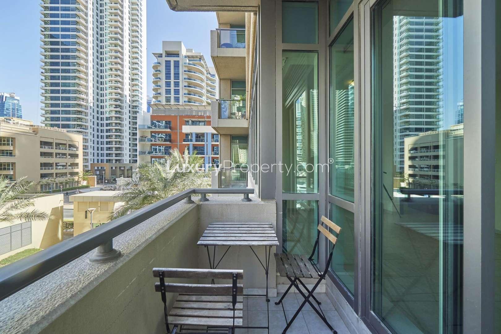 Balcony view from 1-bedroom apartment in Al Majara 2, Dubai Marina, overlooking skyscrapers and marina