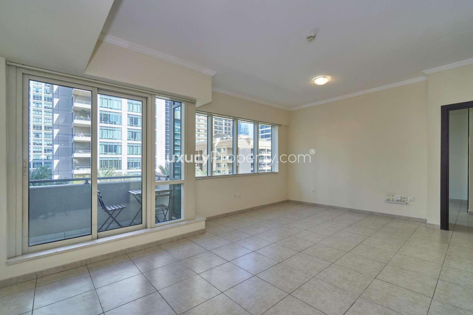 Spacious living room in 1-bedroom apartment, Al Majara 2, Dubai Marina, large windows, city view
