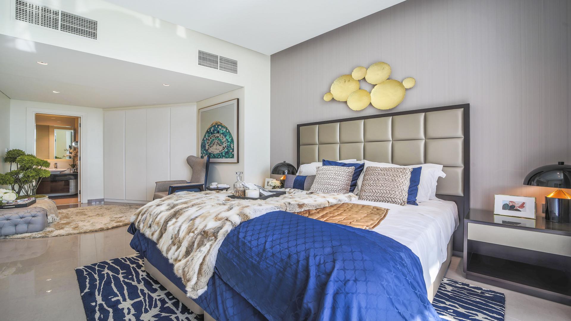Luxury studio apartment bedroom in DAMAC Majestine, Business Bay, with elegant decor and balcony view