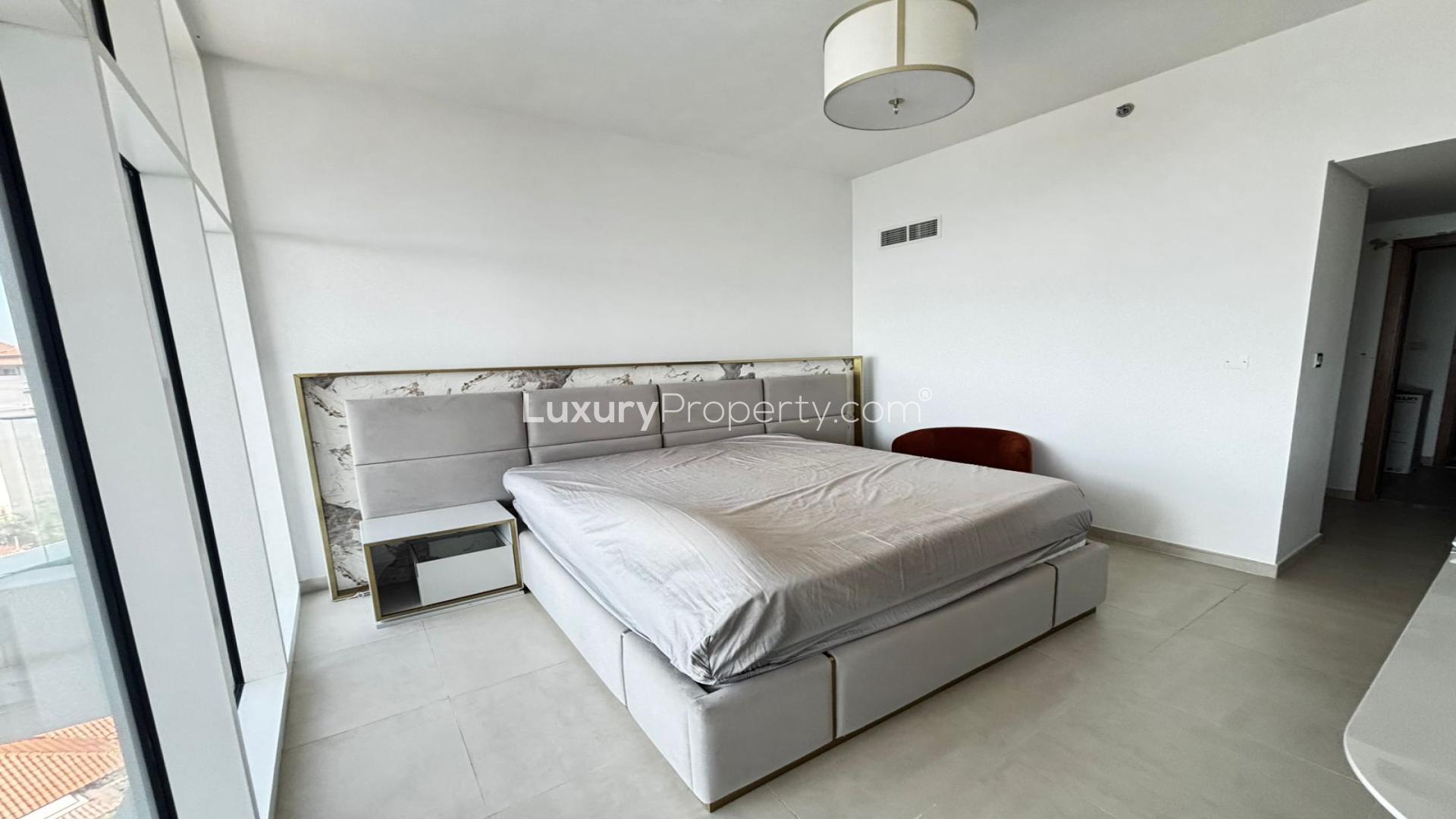 Furnished bedroom with sea view in Azizi Mina apartment, Palm Jumeirah