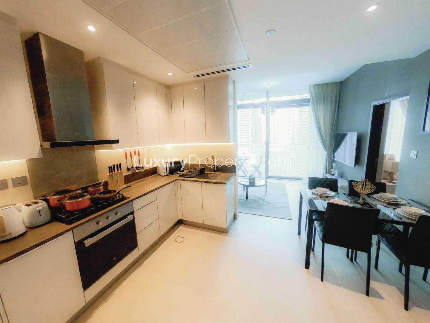 Fully furnished bedroom in Dubai Marina apartment, Marina Gate, with stylish decor and cozy ambiance