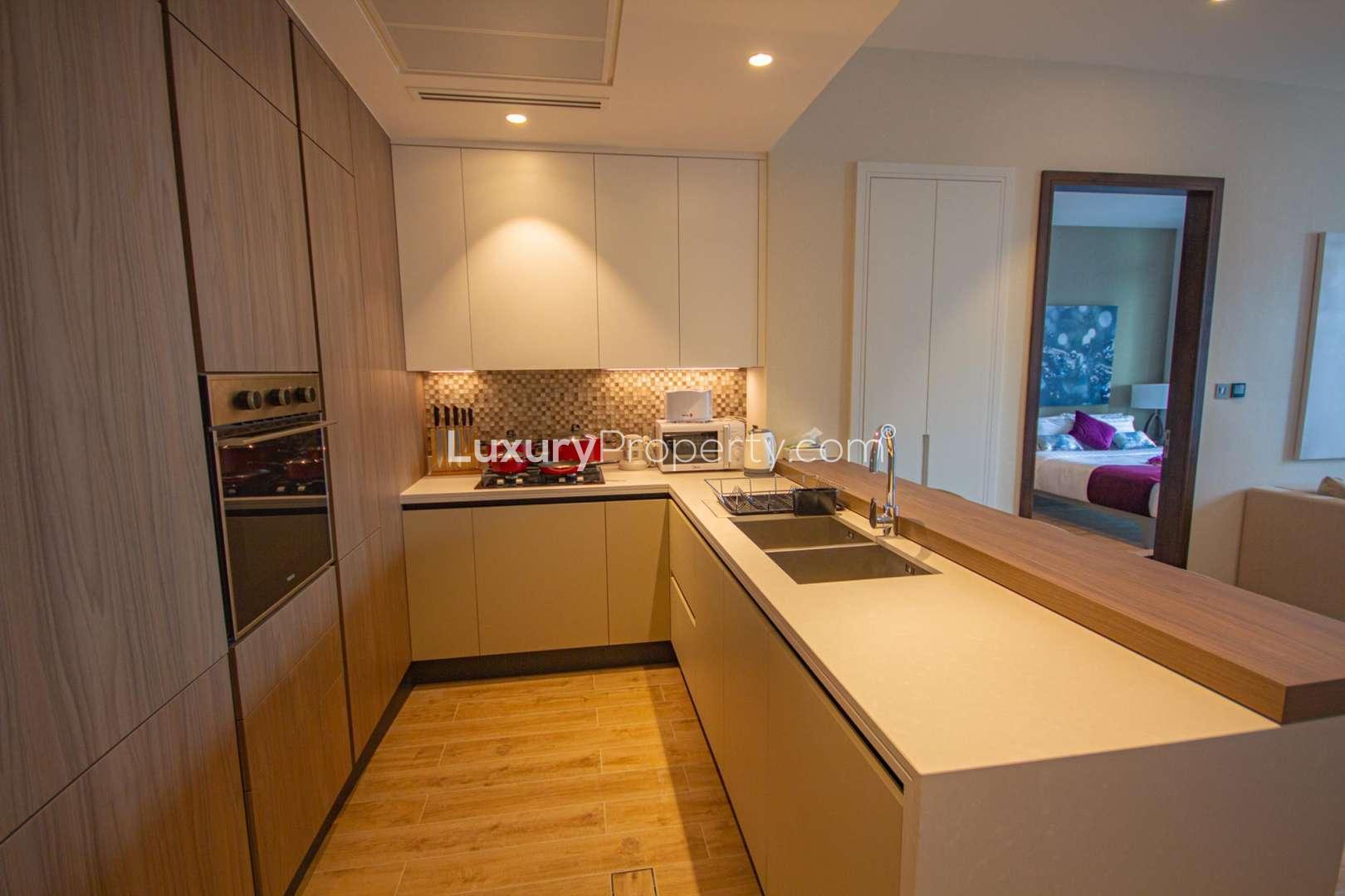 Luxurious bathroom with modern bathtub in Jumeirah Living Marina Gate apartment, Dubai Marina