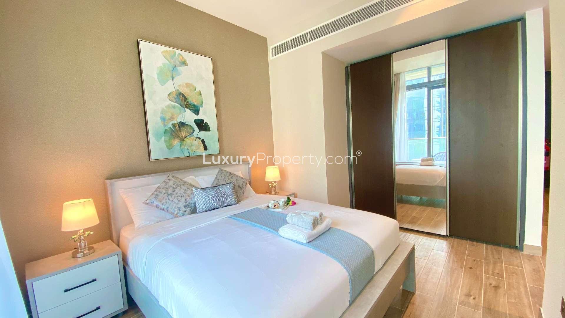 Luxury studio apartment living area in Dubai Marina, featuring modern furnishings and decor