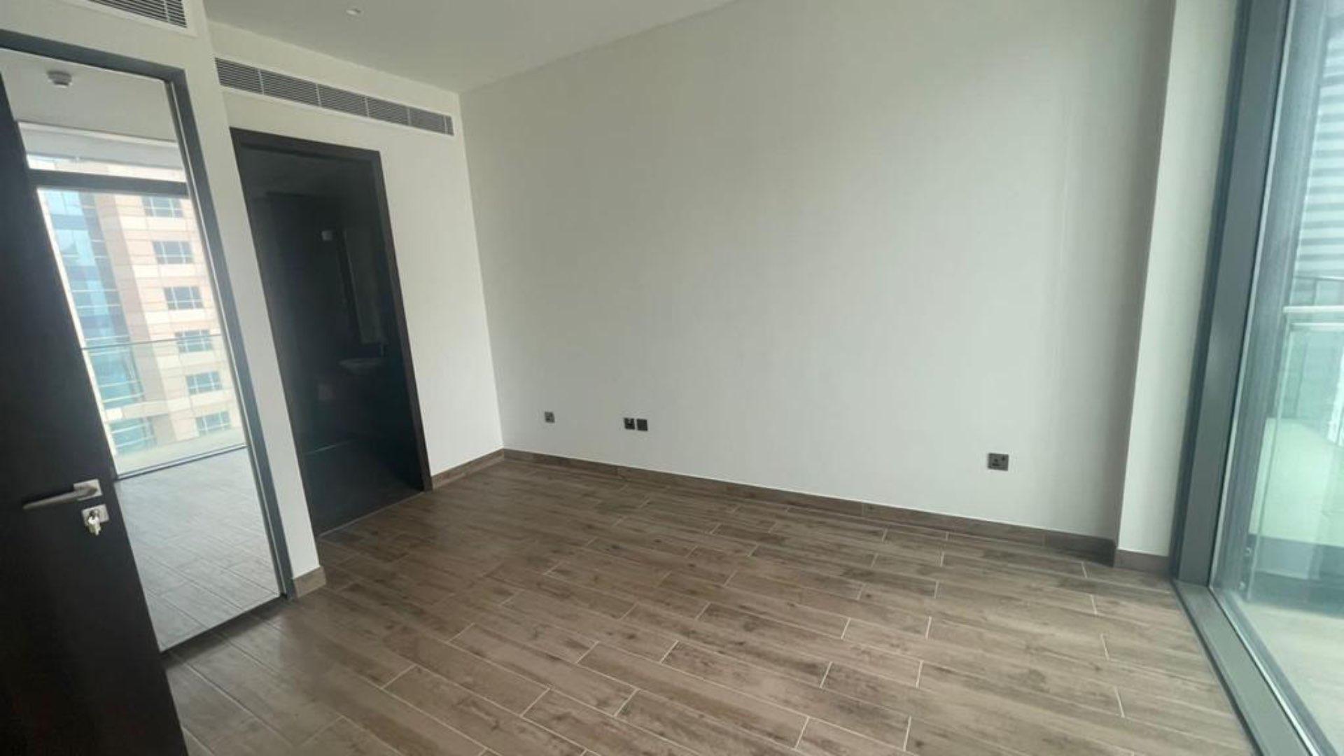 N/A,Empty modern apartment room with wood flooring, large window, Dubai Marina view, Marina Gate