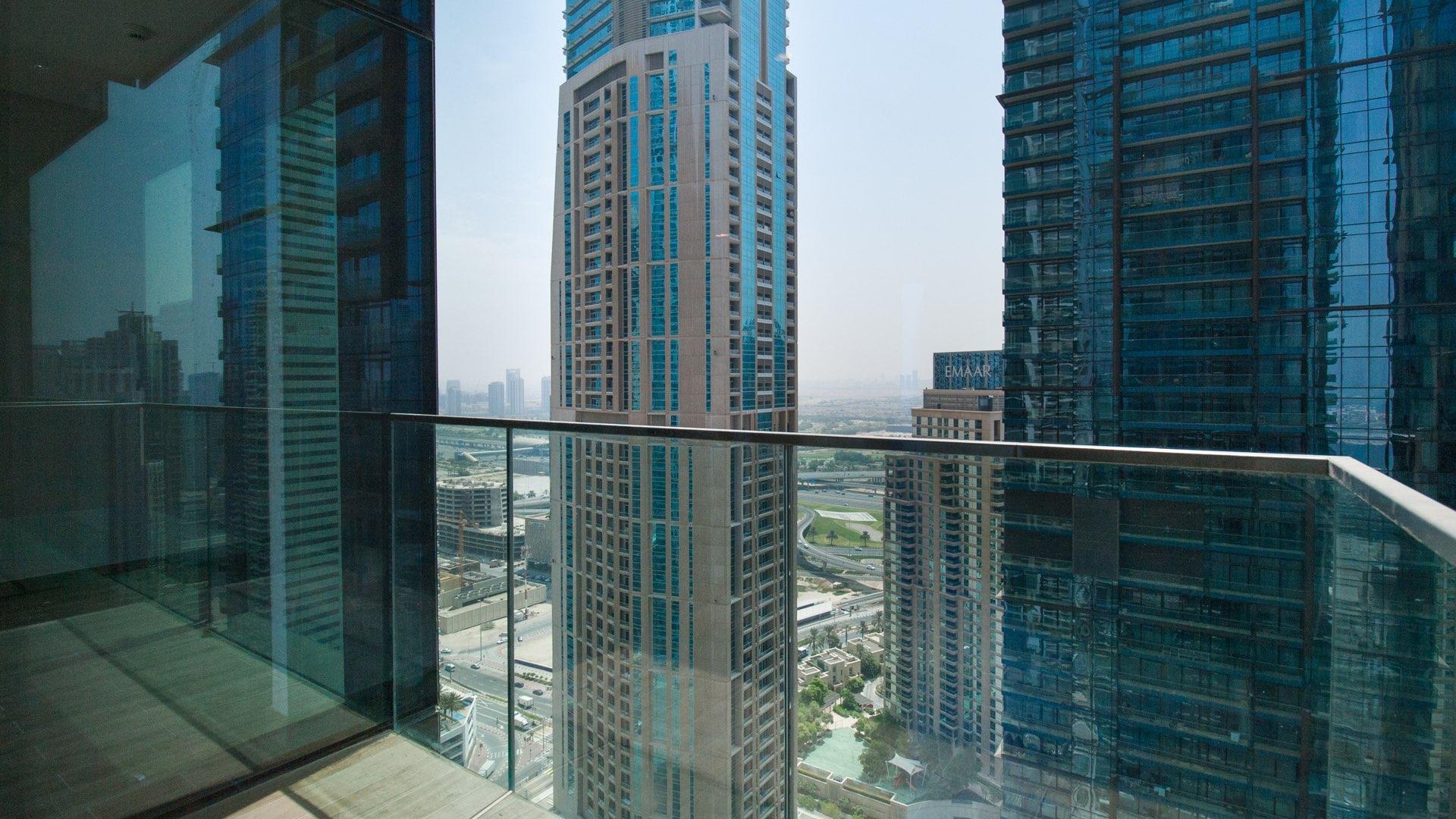 Modern unfurnished apartment with waterfront views, large windows in Dubai Marina's Marina Gate
