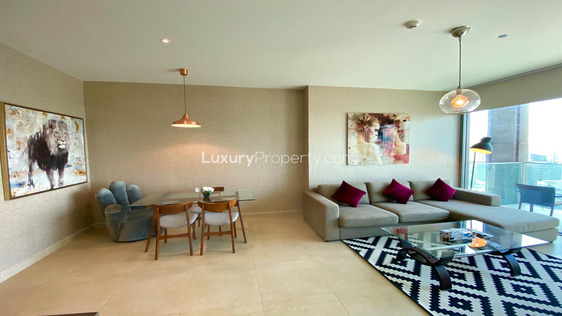 Modern living room in Dubai Marina apartment with stylish decor and marina view