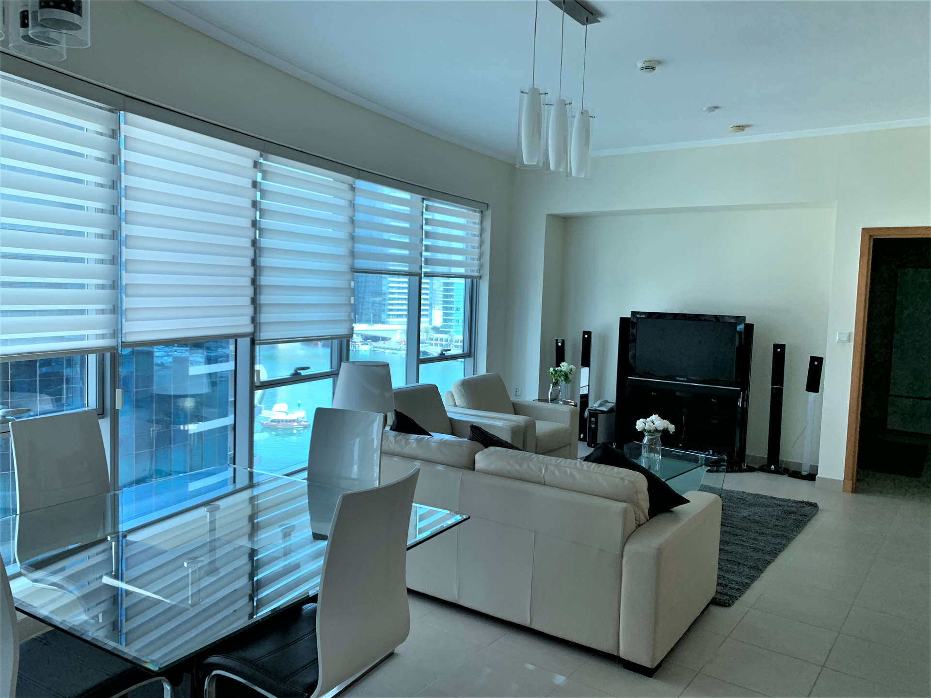 Fully furnished living area in 1-bedroom apartment, Marina Promenade, Dubai Marina, modern decor