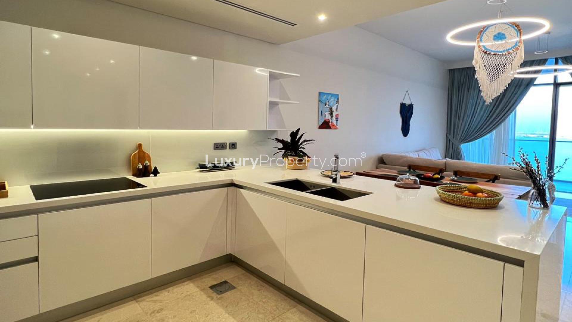 Modern kitchen and dining area in fully furnished Dubai Maritime City apartment