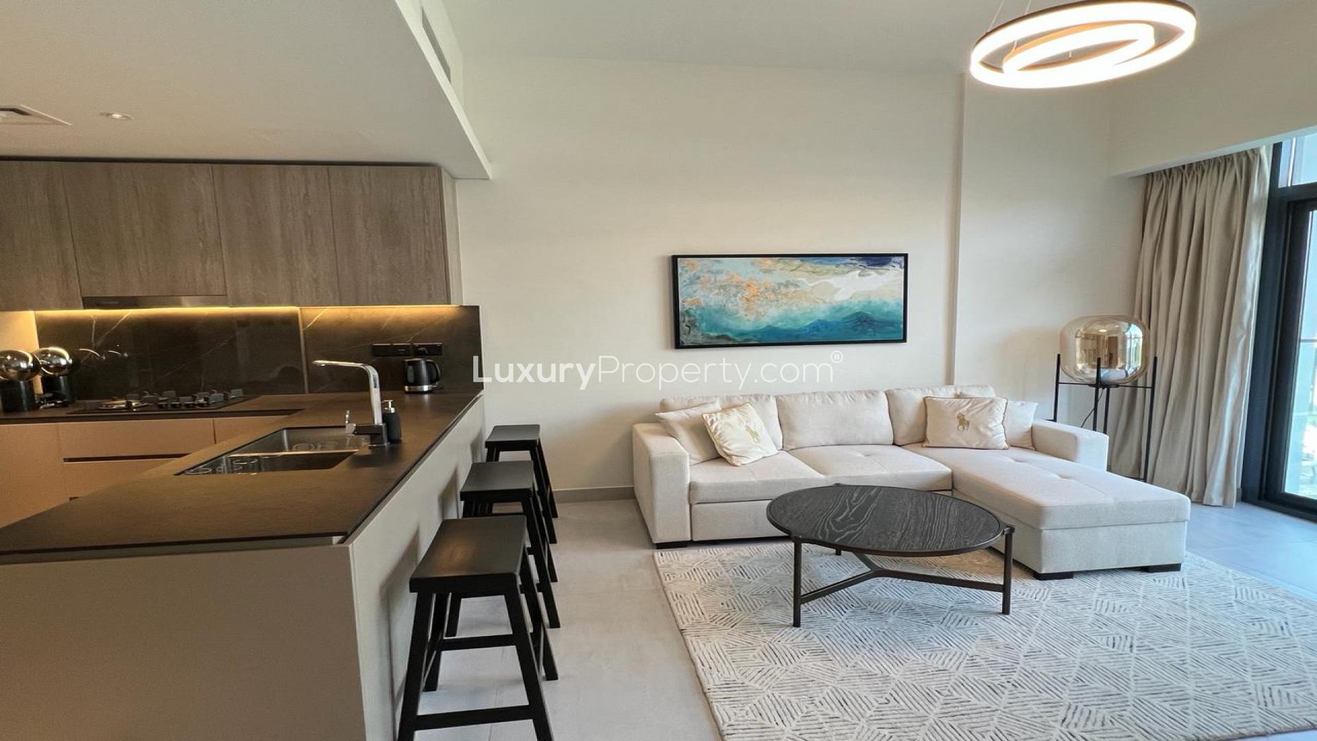 Furnished living room and kitchen in Oxford Boulevard apartment, Jumeirah Village Circle