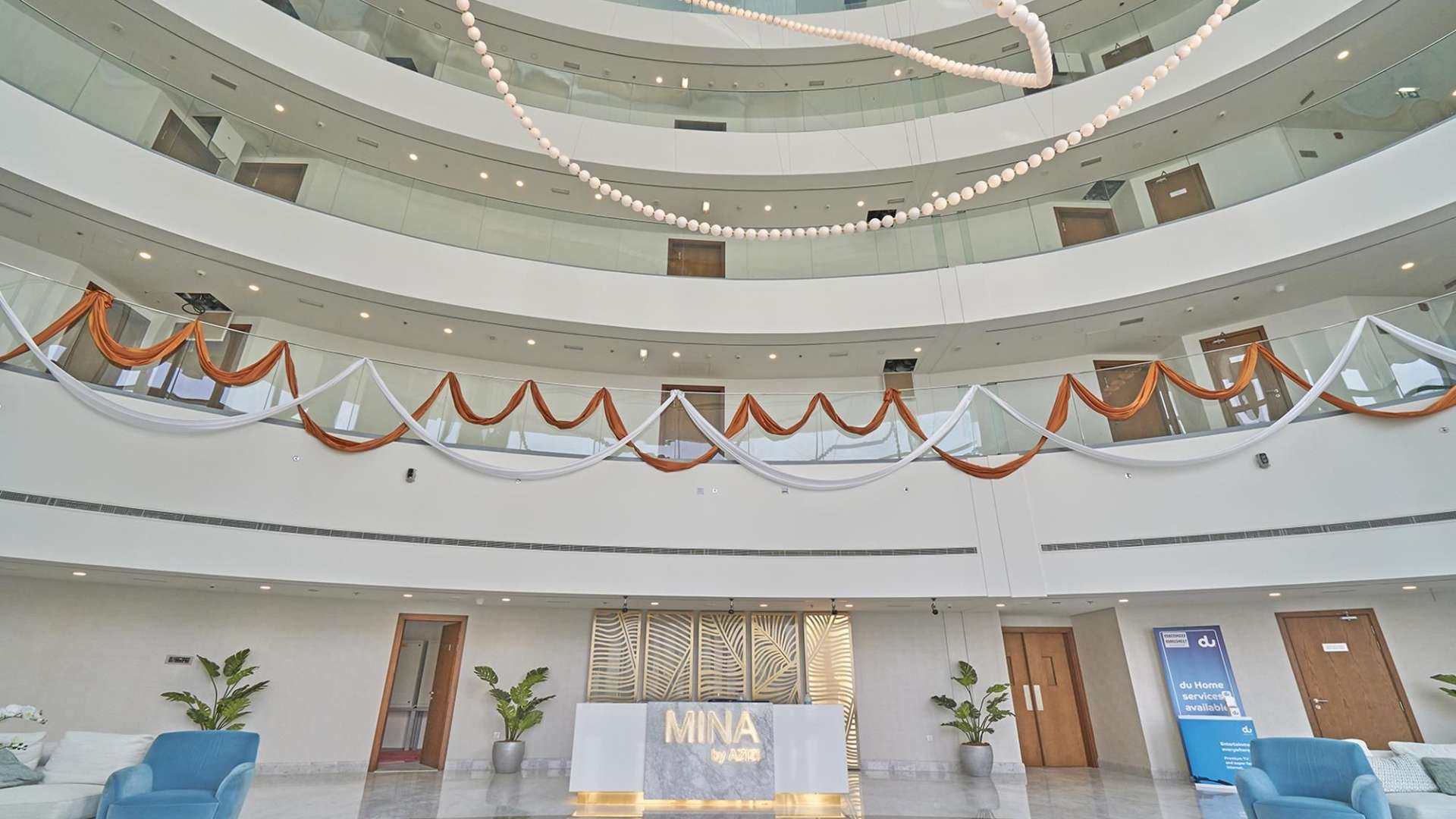 Empty room with large windows in Palm Jumeirah apartment, MINA by Azizi, for rent