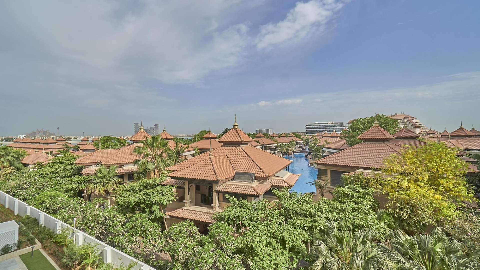 Modern apartment building with pool at MINA by Azizi, Palm Jumeirah