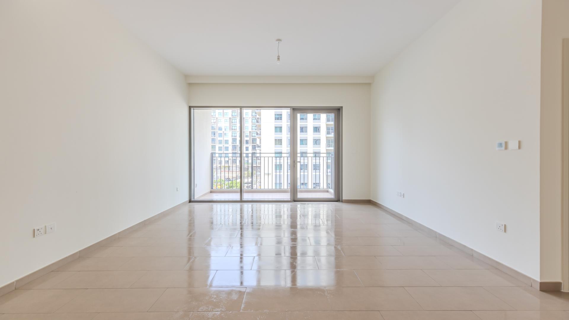 Bright open-plan kitchen and living area in Park Heights apartment, Dubai Hills Estate