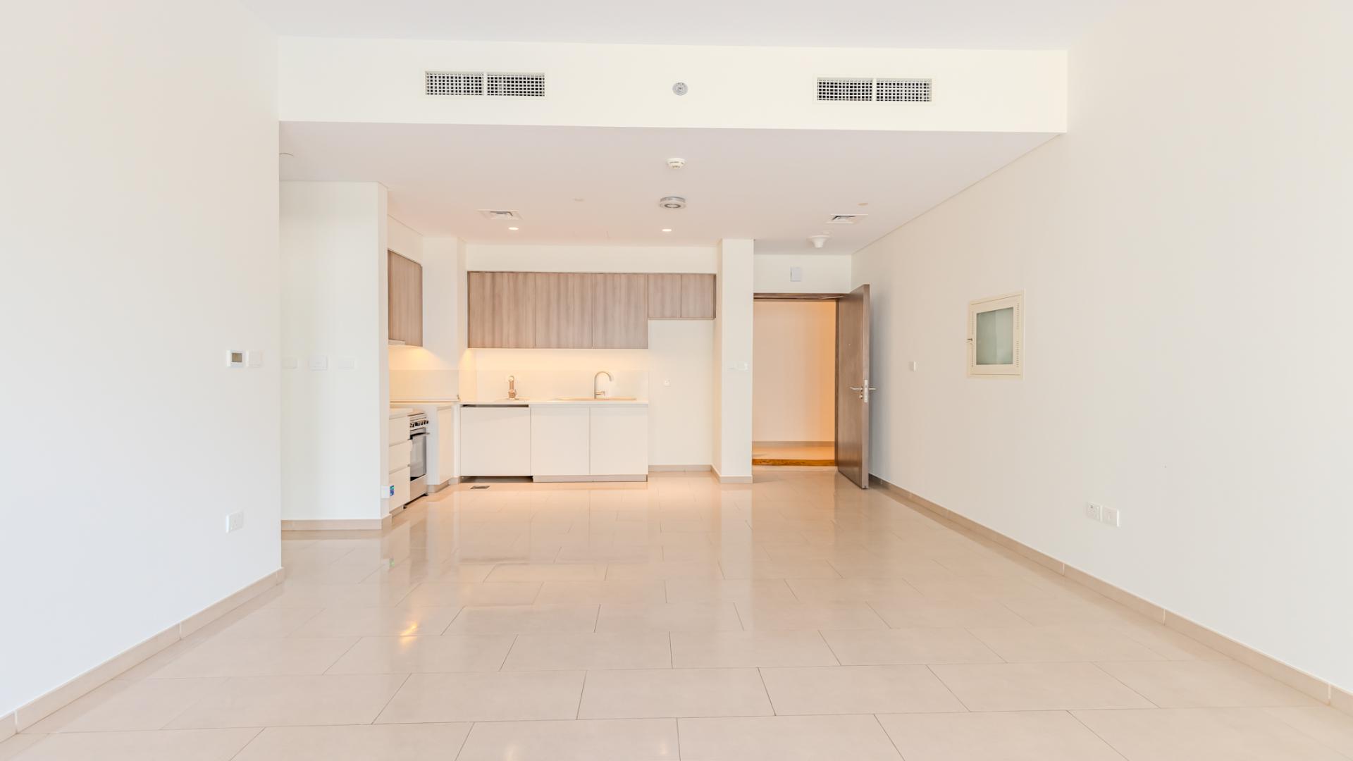 High-floor apartment interior with balcony, Burj views, Park Heights, Dubai Hills Estate