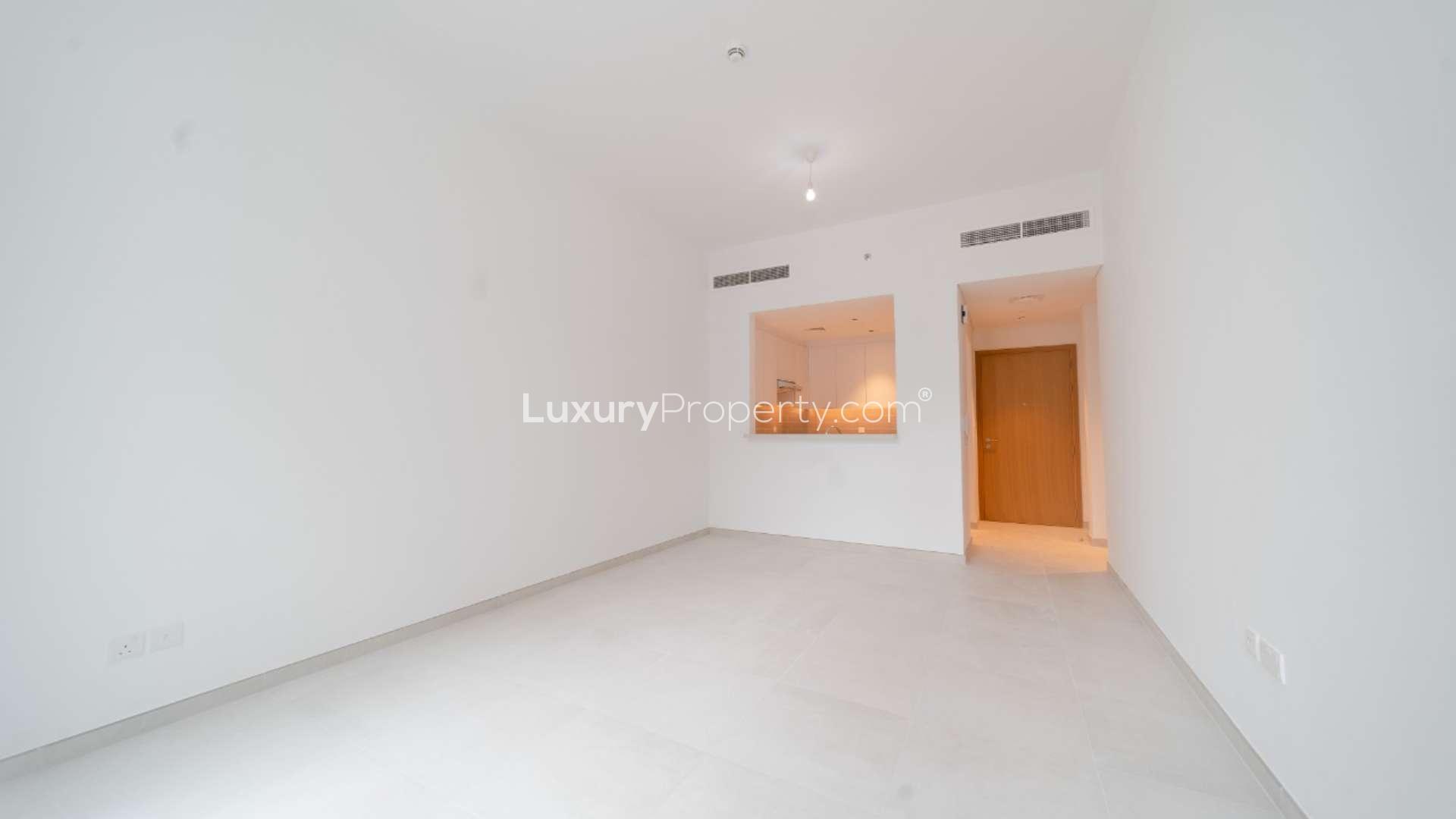 Modern apartment building with pool access in Mudon Views community