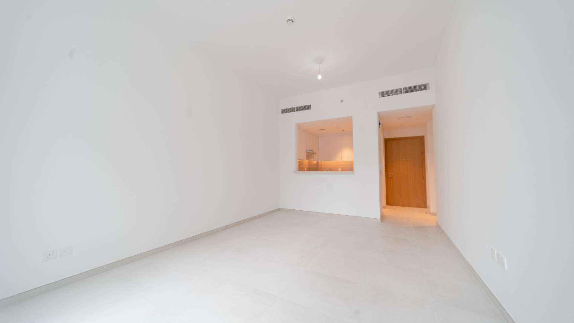 Modern apartment building with pool access in Mudon Views community