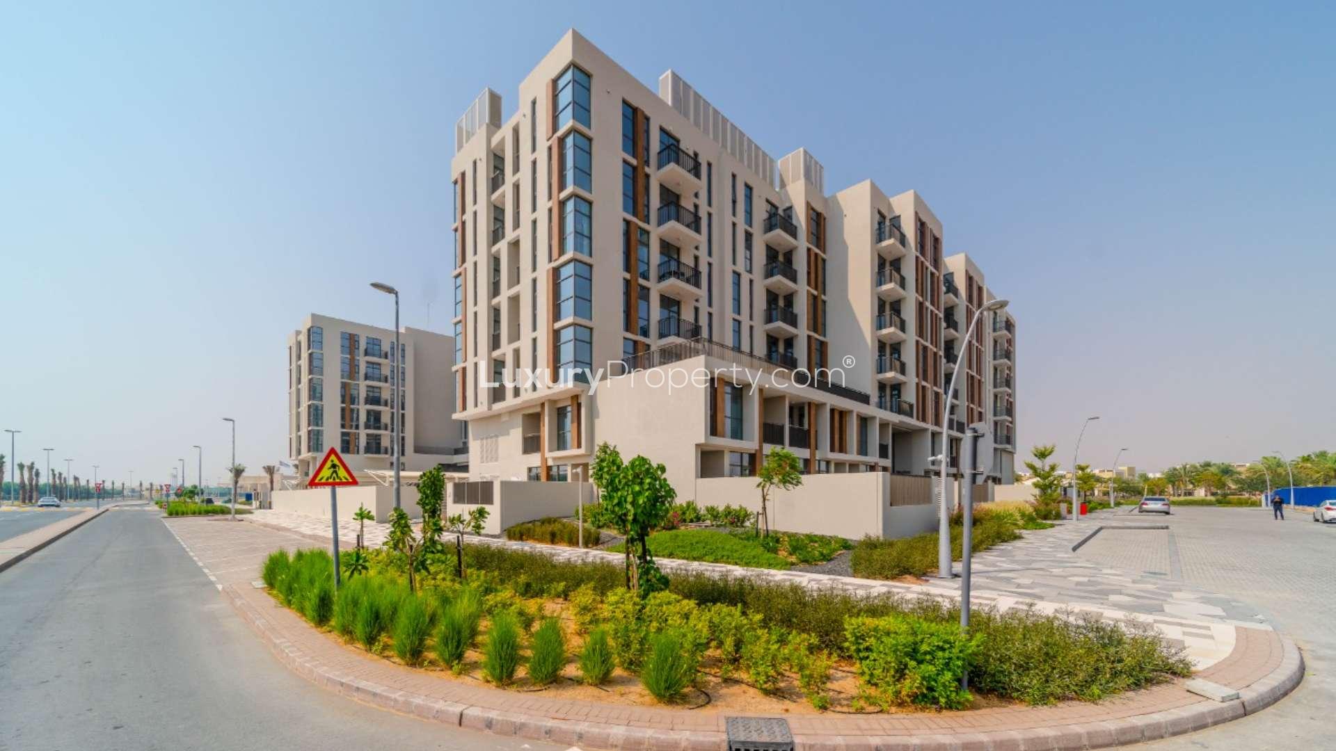 Spacious living room with large windows in Mudon Views 1-bedroom apartment for rent