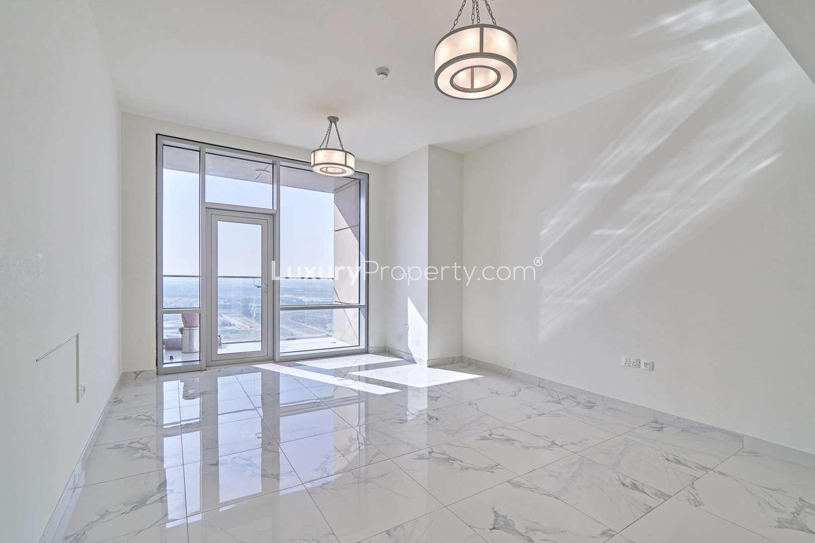 Spacious living area with marble flooring in Noora Tower apartment, Al Habtoor City