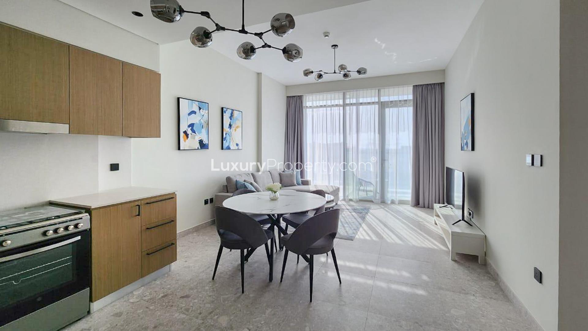N/A,Fully furnished Dubai Hills apartment interior with modern kitchen and cozy living area